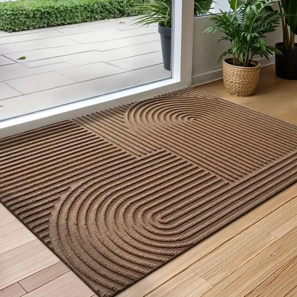 Felpudo Creston: microfibra, diseño de hilo curvado, uso interior y exterior