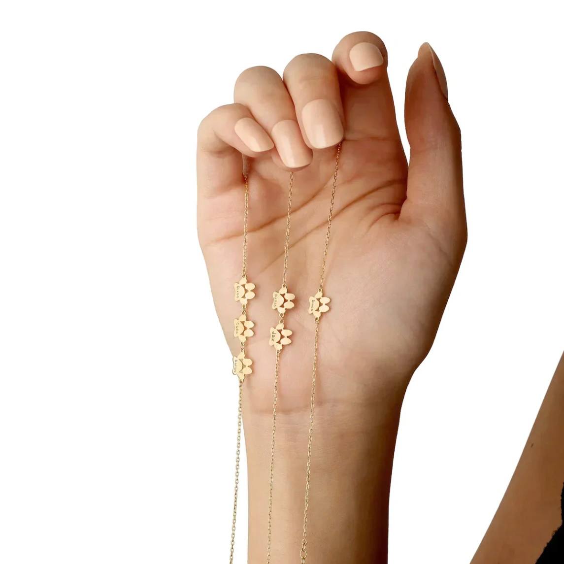 Pulsera con dije de pata de mascota grabada
