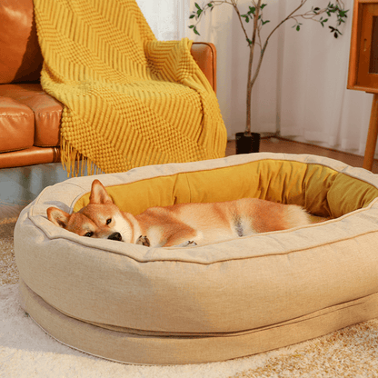 Round Bolster Pet Bed with Orthopedic Foam Support for Dogs | Raised Edge Calming Bed with Machine Washable Cover & Waterproof Liner