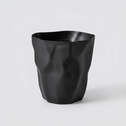 CURVEBIN – Papelera de forma irregular con diseño que ahorra espacio