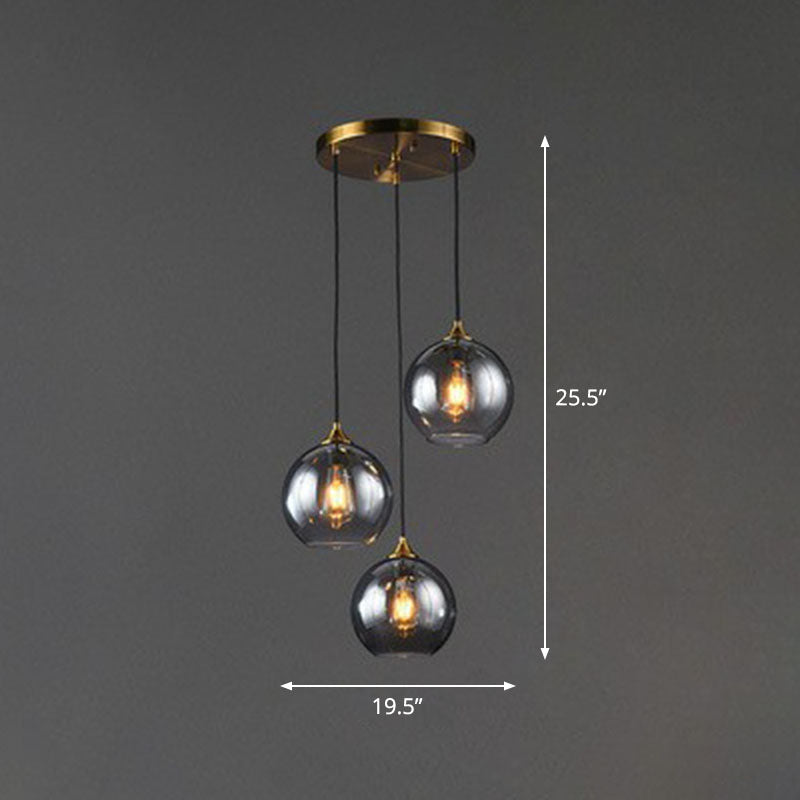 Three-Light Hanging Ceiling Fixture with Tapered Glass Globes in Antique Brass Finish for Dining Room Kitchen Island