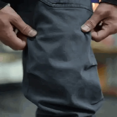 Pantalones cargo, bolsillos múltiples, puños con cremallera