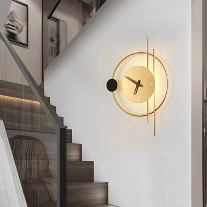 Backlit Metal Wall Clock 22 in × 16 in Gold Black Round Geometric Timepiece for Home Office Entry Foyer Den Workspace Ambient Glow Battery O
