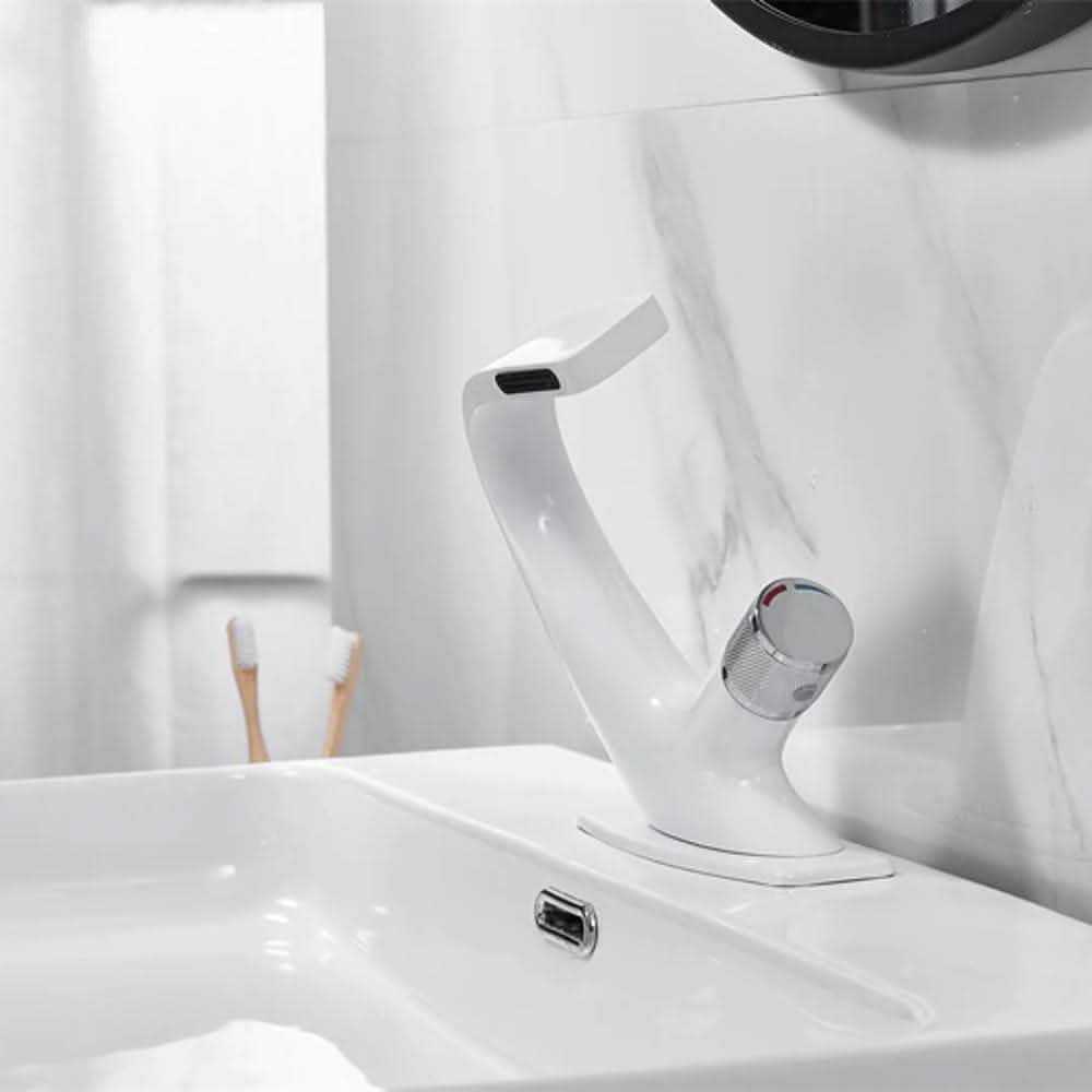 AQUAVEL – Modern Brass Waterfall Basin Mixer for Elegant Bathroom Design