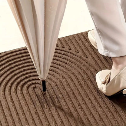 Felpudo Creston: microfibra, diseño de hilo curvado, uso interior y exterior