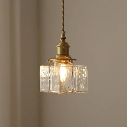 Ribbed Glass Globe Hanging Light Fixture with Brass Accents for Dining Areas and Entryways