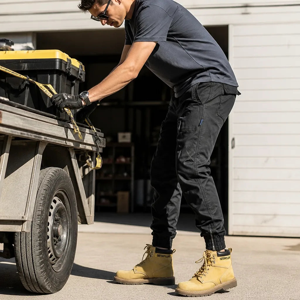 Pantalones cargo, bolsillos múltiples, puños con cremallera