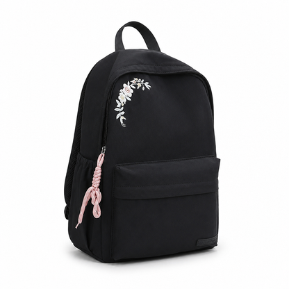 Mochila escolar con bordado floral y múltiples bolsillos