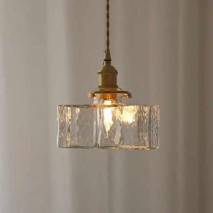 Ribbed Glass Globe Hanging Light Fixture with Brass Accents for Dining Areas and Entryways