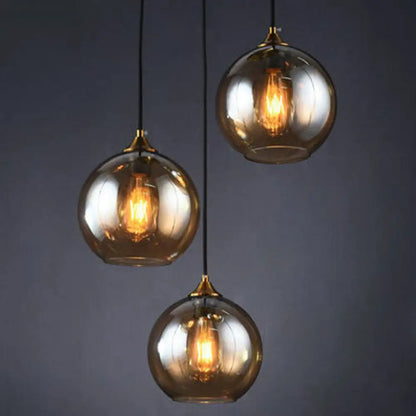 Three-Light Hanging Ceiling Fixture with Tapered Glass Globes in Antique Brass Finish for Dining Room Kitchen Island