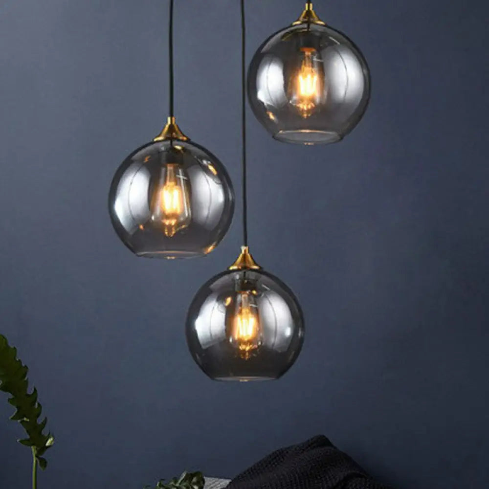 Three-Light Hanging Ceiling Fixture with Tapered Glass Globes in Antique Brass Finish for Dining Room Kitchen Island