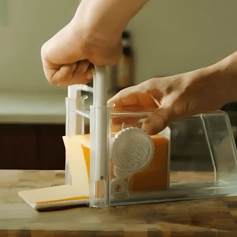 Kitchen Master | 4-in-1 Cheese Slicer & Grater with Built-In Storage | Versatile Food Prep Tool for Easy Cooking
