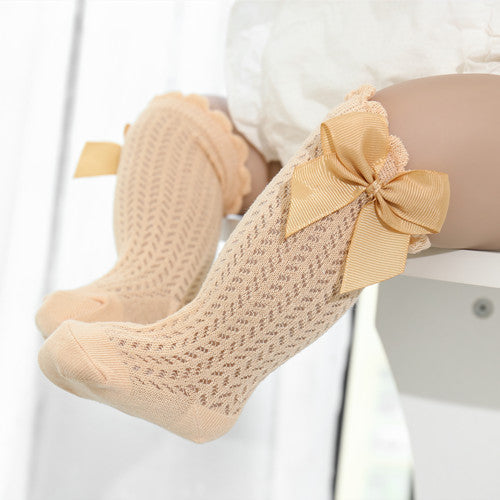 Infant Knee-High Socks with Oversized Ribbon Accent for Girls | Breathable Mesh Knit Footwear for Newborns and Toddlers 0-24 Months