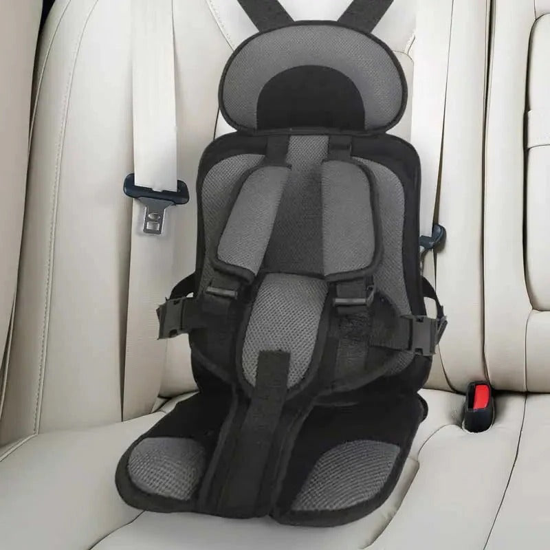 Asiento elevador de coche para niños con arnés de seguridad