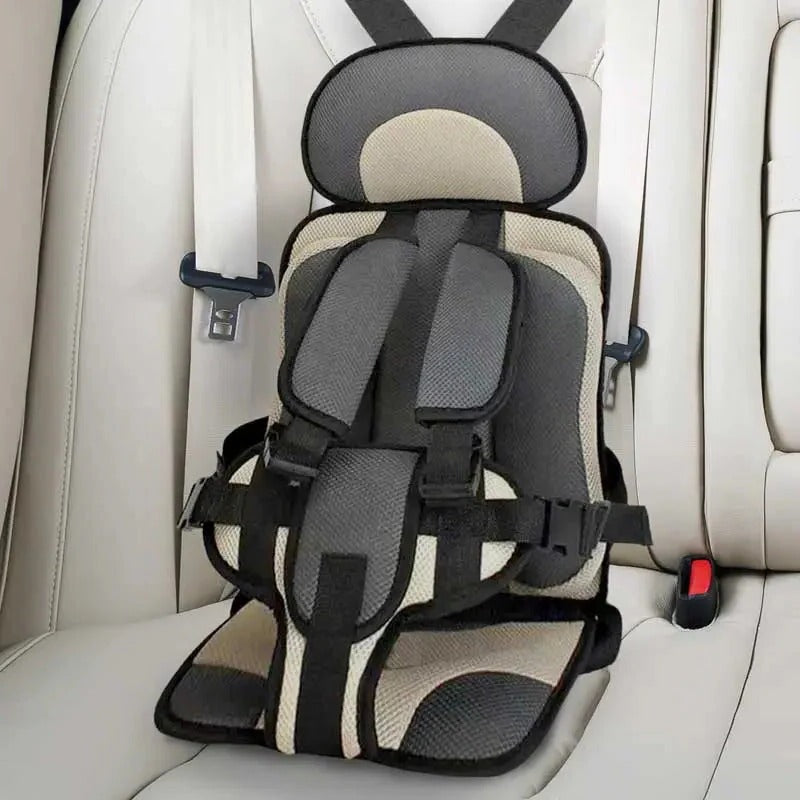 Asiento elevador de coche para niños con arnés de seguridad