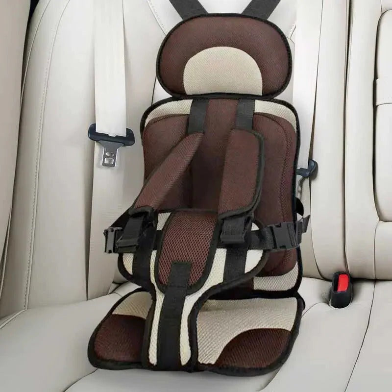 Asiento elevador de coche para niños con arnés de seguridad