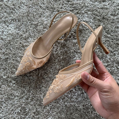 Elegantes sandalias destalonadas para mujer