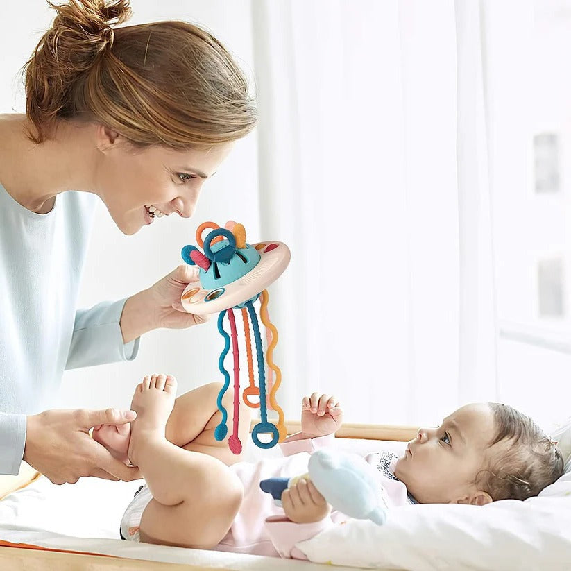 Juguete mordedor suave para bebés con cuerda para tirar
