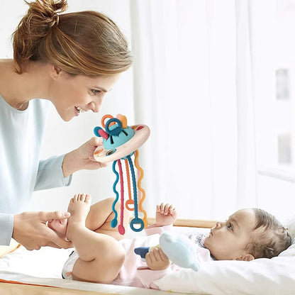 Juguete mordedor suave para bebés con cuerda para tirar
