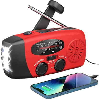 Radio AM/FM compacta con manivela y linterna