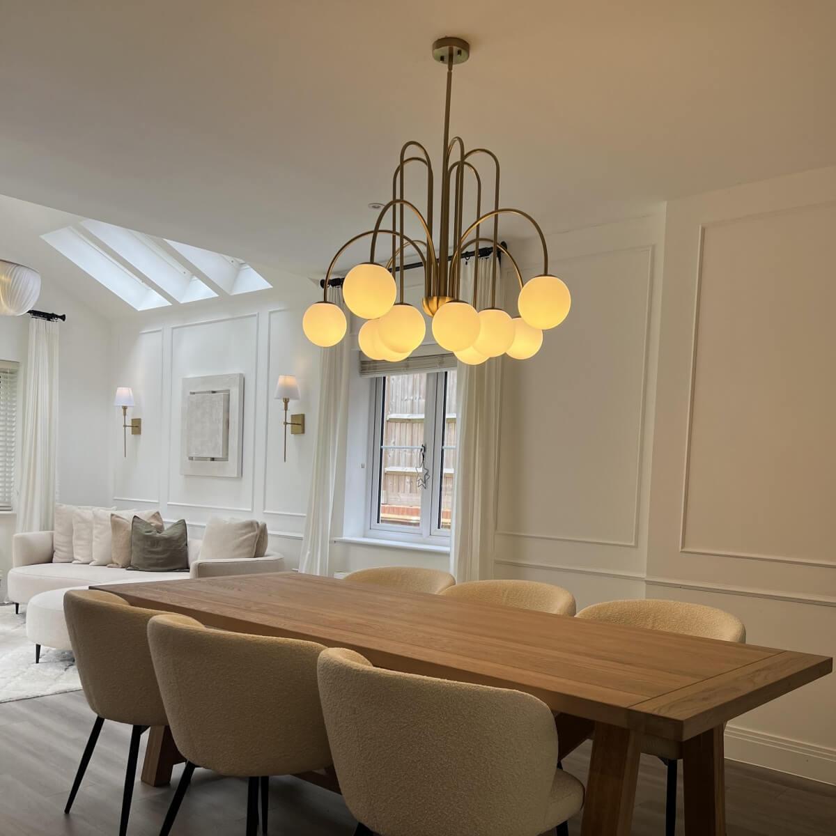 Ten-Globe Pendant Light with Frosted Glass Spheres & Curved Arms for Dining Rooms – Adjustable Height Fixture in Dual-Tone Metallic Finish,